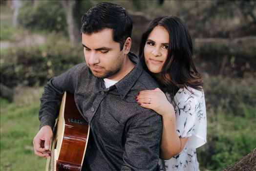 Mirror's Edge Photography captures CiCi and Rocky's Sunrise Engagement in Los Osos California at Los Osos Oaks Reserve. Guitar at engagement session