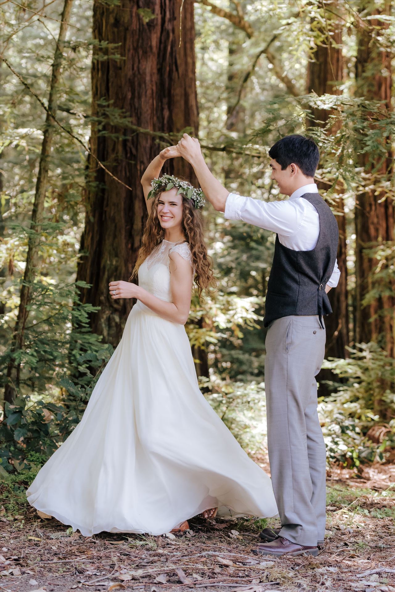 FW-6667.JPGMt Madonna wedding in the redwoods outside of Watsonville, California with a romantic and classic vibe by sarah williams of mirror's edge photography a san luis obispo wedding photographer.  Bride and Groom dancing in the forest