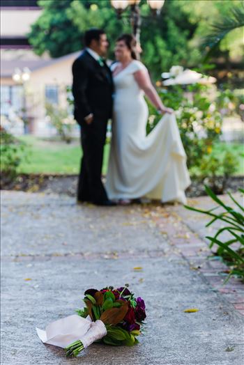 Wedding photography at the Historic Santa Maria Inn in Santa Maria, California by Mirror's Edge Photography. Bouquet and the Bride and Groom.