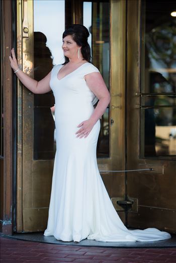 Wedding photography at the Historic Santa Maria Inn in Santa Maria, California by Mirror's Edge Photography. Beautiful Bride and the revolving door.