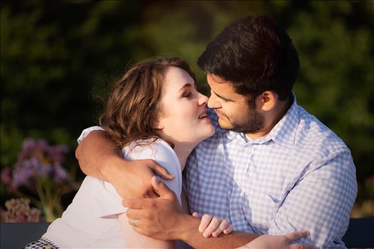 Sarah Williams of Mirror's Edge Photography, a San Luis Obispo Wedding and Engagement Photographer, captures Kara-Leigh and Deaven's amazing Engagement Photography Session at the Dinosaur Caves Park in Pismo Beach California. Sweet kiss.