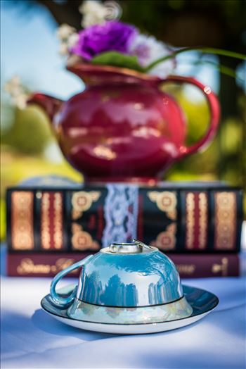 Mirror's Edge Photography captures a high tea wedding at the Cypress Ridge Golf Club and Pavilion in Arroyo Grande, California.  Rings and a tea cup like Alice in Wonderland