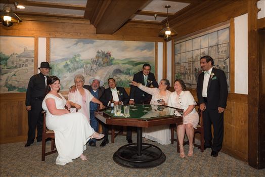 Wedding photography at the Historic Santa Maria Inn in Santa Maria, California by Mirror's Edge Photography.  Bride and Groom the Poker table