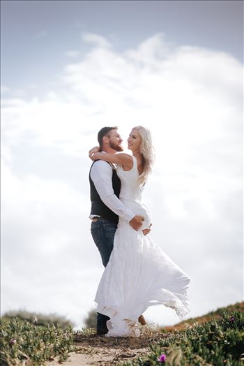 Mirror's Edge Photography, a San Luis Obispo County Wedding and Engagement Photographer, captures Sarah and Jeremy's intimate wedding on Pismo State Beach in Grover Beach, California.  Bride and Groom in the clouds