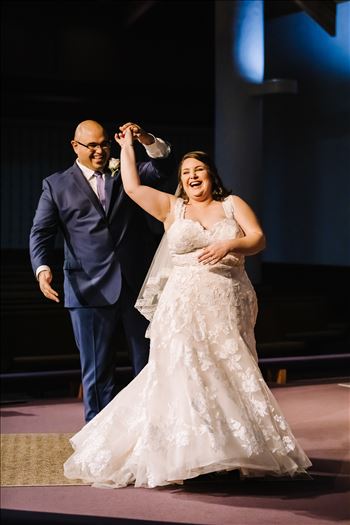 Sarah Williams of Mirror's Edge Photography and San Luis Obispo and Santa Barbara Wedding Photographer captures the Ochoa Wedding. Bride and Groom dance at Trinity Church.