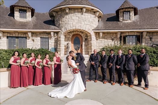 Sarah Williams of Mirror's Edge Photography captures the gorgeous fairy tale wedding day of Victoria and Esteban at the Castle Noland Wedding Venue in San Luis Obispo, California.  The wedding party bridesmaids and groomsmen in front of the castle