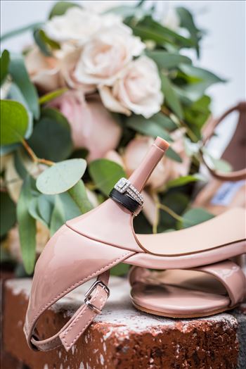 Cayucos California Beach and Bluffs Wedding near Morro Bay and Cambria with romantic chic flair by Mirror's Edge Photography, San Luis Obispo County Wedding Photographer.  Wedding rings, flowers and brides shoes