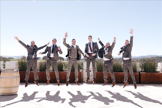 Mirror's Edge Photography captures Edith and Kyle's wedding at the Tooth and Nail Winery in Paso Robles California. Groom and Groomsmen do the jump.