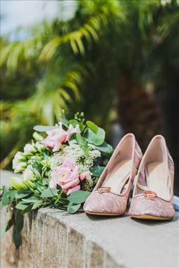 Wedding at Dolphin Bay Resort and Spa in Shell Beach, California by Sarah Williams of Mirror's Edge Photography, a San Luis Obispo County Wedding Photographer. Shoes, flowers and rings