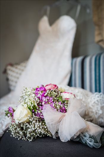 Wedding photography at the Kimpton Goodland Hotel in Santa Barbara California by Mirror's Edge Photography.  Wedding Flowers and dress in Airstream