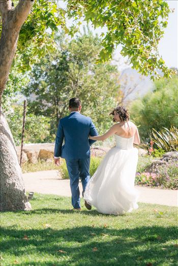 Mirror's Edge Photography captures Maryanne and Michael's magical wedding in the Secret Garden at the iconic Madonna Inn in San Luis Obispo, California.  Bride and Groom after saying "I Do"