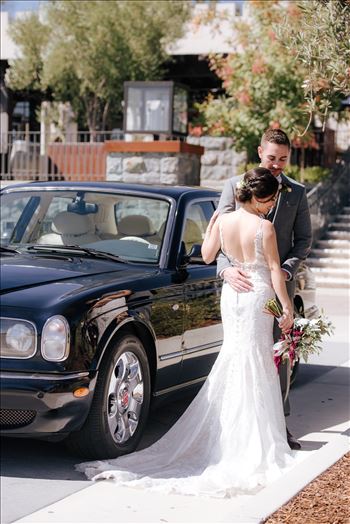 Mirror's Edge Photography captures Edith and Kyle's wedding at the Tooth and Nail Winery in Paso Robles California. Bride and Groom by the Bentley
