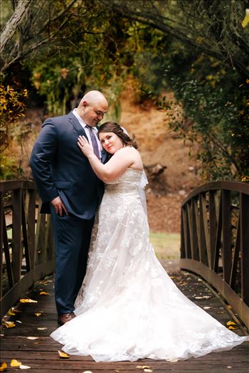 Sarah Williams of Mirror's Edge Photography and San Luis Obispo and Santa Barbara Wedding Photographer captures the Ochoa Wedding. Bride and Groom at Miguelito Park Bridge romantic.