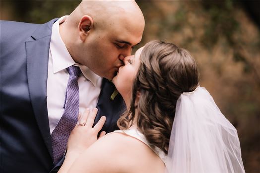 Sarah Williams of Mirror's Edge Photography and San Luis Obispo and Santa Barbara Wedding Photographer captures the Ochoa Wedding.  Bride and Groom kiss in Miguelito Park.