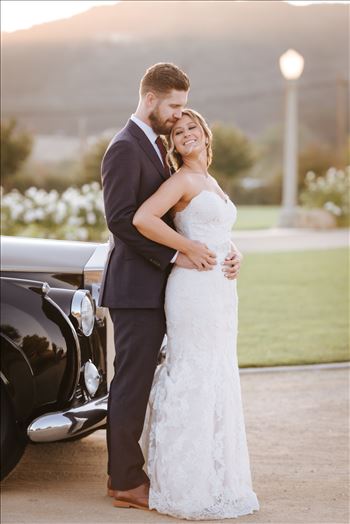 White Barn in Edna Valley rustic chic wedding by Mirror's Edge Photography, San Luis Obispo County Wedding and Engagement Photographer.  Sunset elegance with Rolls Royce and Bride and Groom in front of the White Barn in Edna Valley California.