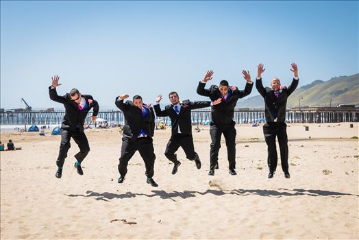 Sea Venture Resort and Spa Wedding Photography by Mirror's Edge Photography in Pismo Beach, California. Groom and Groomsmen jumping