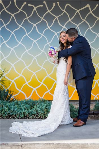 Wedding photography at the Kimpton Goodland Hotel in Santa Barbara California by Mirror's Edge Photography.  Retro Bride and Groom by Art Wall