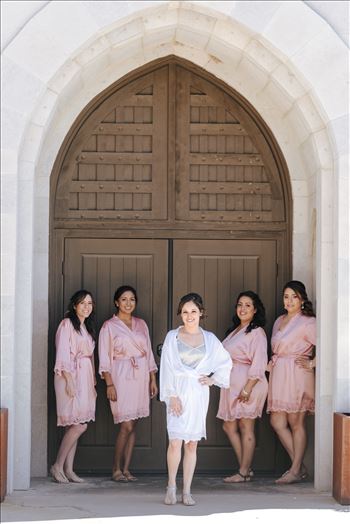 Mirror's Edge Photography captures Edith and Kyle's wedding at the Tooth and Nail Winery in Paso Robles California. Bride and her bridesmaids by the door