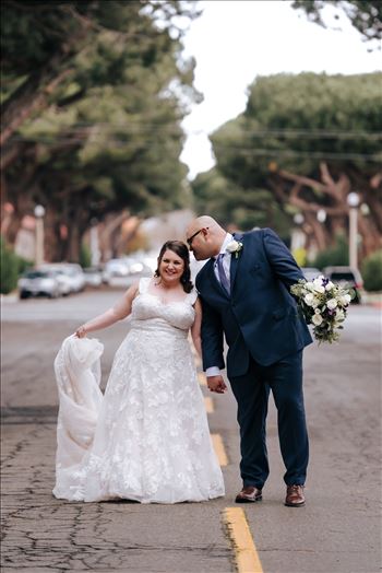 Sarah Williams of Mirror's Edge Photography and San Luis Obispo and Santa Barbara Wedding Photographer captures the Ochoa Wedding. Bride and Groom laughing in Downtown Lompoc.