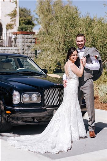 Mirror's Edge Photography captures Edith and Kyle's wedding at the Tooth and Nail Winery in Paso Robles California. Bride and Groom next to the getaway car