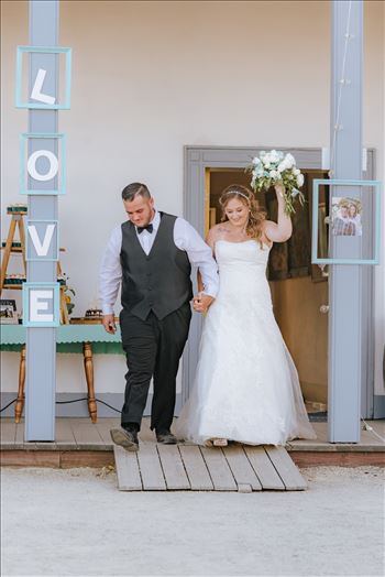 Mirror's Edge Photography, a San Luis Obispo Wedding Photographer, captures a wedding at the Historic Dana Adobe in Nipomo California.  Grand Entrance from the Dana Adobe.