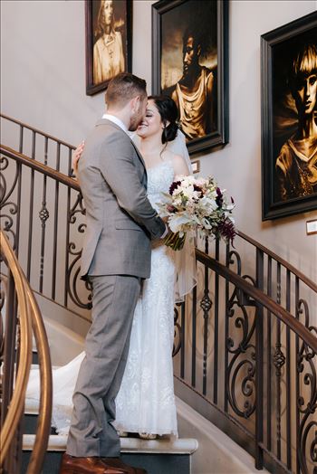 Mirror's Edge Photography captures Edith and Kyle's wedding at the Tooth and Nail Winery in Paso Robles California. First look on the staircase kiss.