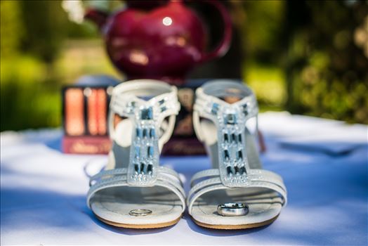 Mirror's Edge Photography captures a high tea wedding at the Cypress Ridge Golf Club and Pavilion in Arroyo Grande, California.  Rings, shoes and a tea pot.