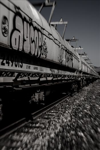 Graffiti on oil tankers and infinity train tracks