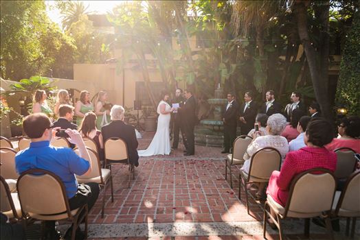 Wedding photography at the Historic Santa Maria Inn in Santa Maria, California by Mirror's Edge Photography. Sunny day ceremony in the courtyard.
