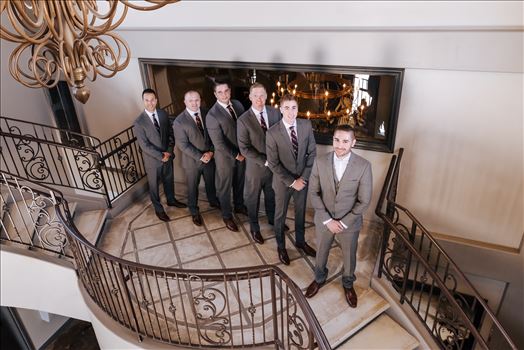 Mirror's Edge Photography captures Edith and Kyle's wedding at the Tooth and Nail Winery in Paso Robles California. Groom and groomsmen on the staircase