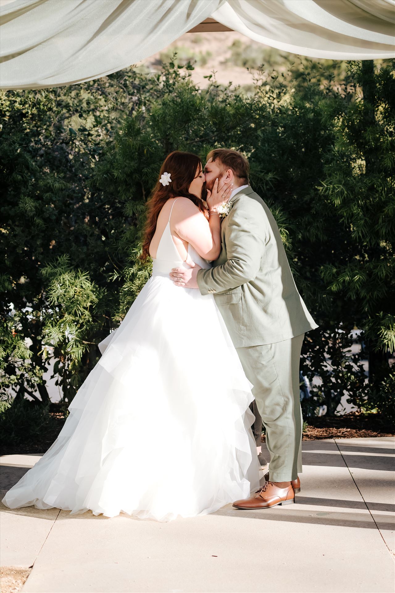 Final-4482.jpg - Sarah Williams of Mirror's Edge Photography, a San Luis Obispo County Wedding and Engagement Photographer, captures the amazing wedding of Justine and Reece at the Monday Club in San Luis Obispo California. The kiss bride and groom by Sarah Williams