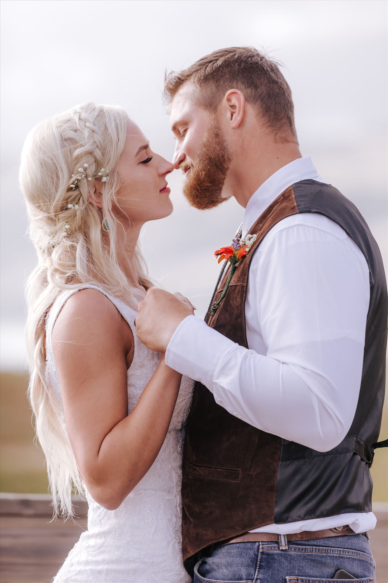 _Y9A7012.JPGPismo Beach Wedding in San Luis Obispo County by Mirror's Edge Photography.  Gorgeous windswept beach wedding vibes with a country and boho flair. Bride and groom romantic