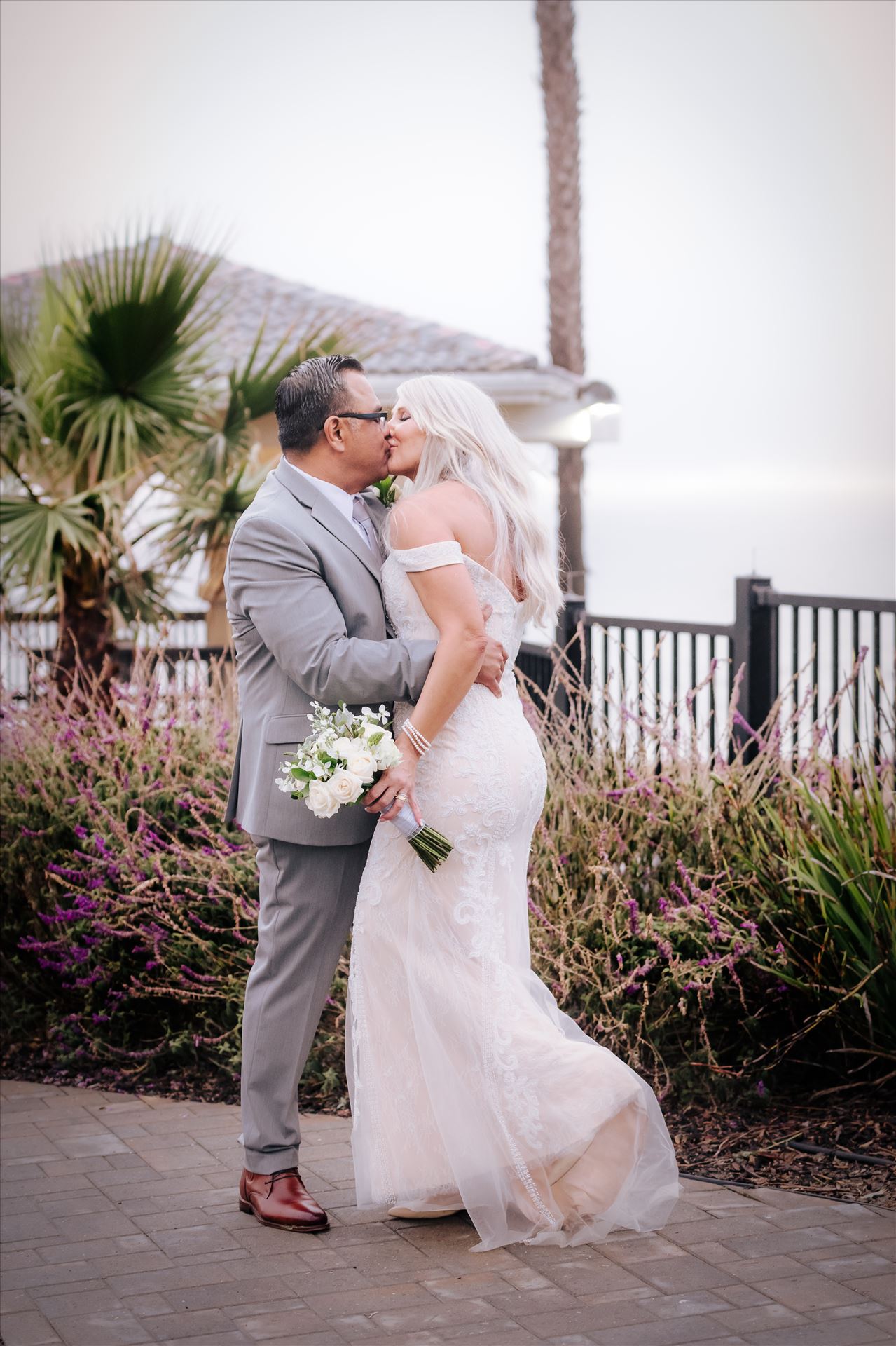 Final--3.jpgRainy day wedding at the Shore Cliff Hotel Gazebo in Pismo Beach, California in San Luis Obispo County by Mirror's Edge Photography.  Beautiful wedding gazebo bride and groom on a rainy day in Pismo Beach.