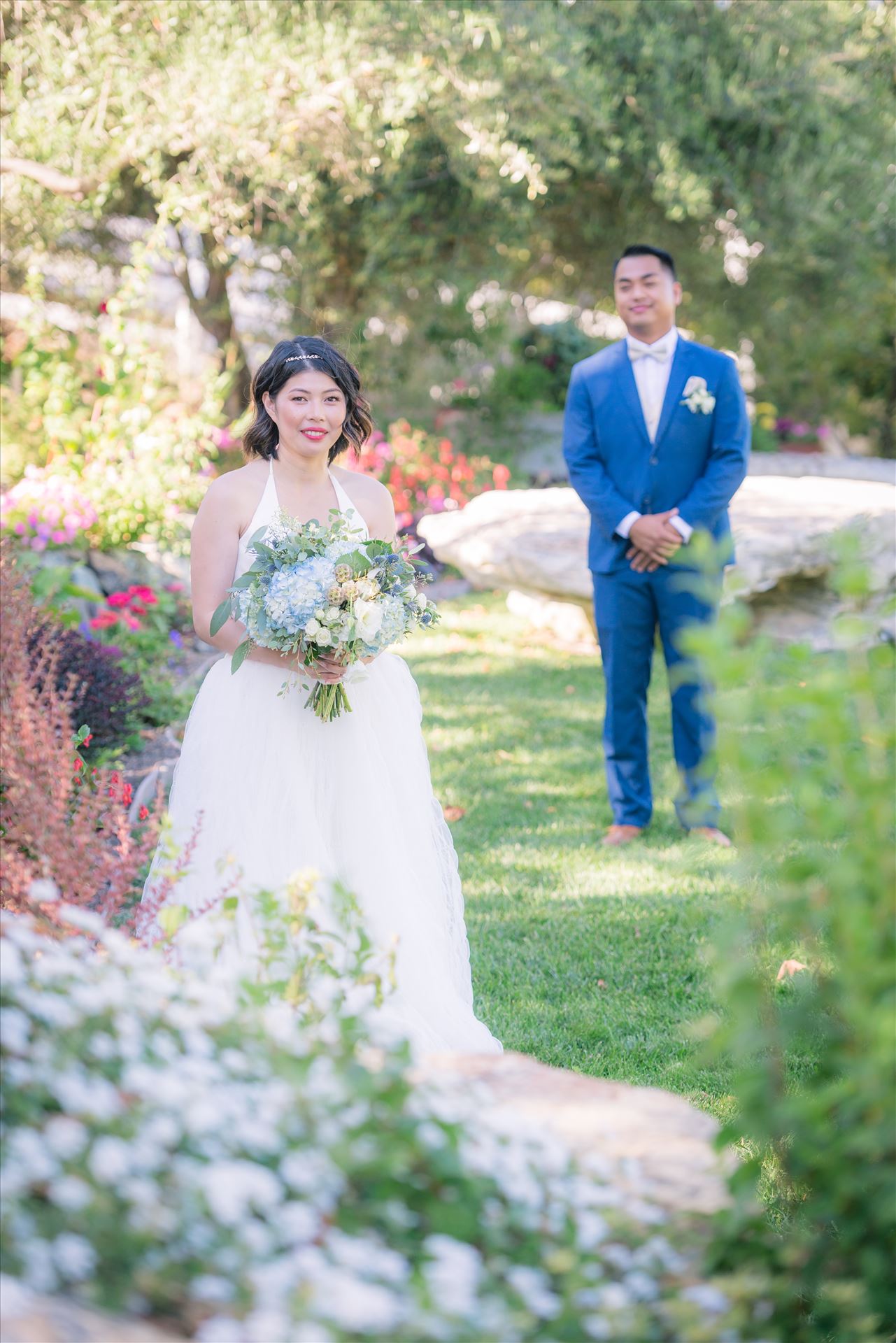 Maryanne and Michael at Madonna Inn 103 - Mirror's Edge Photography captures Maryanne and Michael's magical wedding in the Secret Garden at the iconic Madonna Inn in San Luis Obispo, California. Beautiful Bride in the garden by Sarah Williams