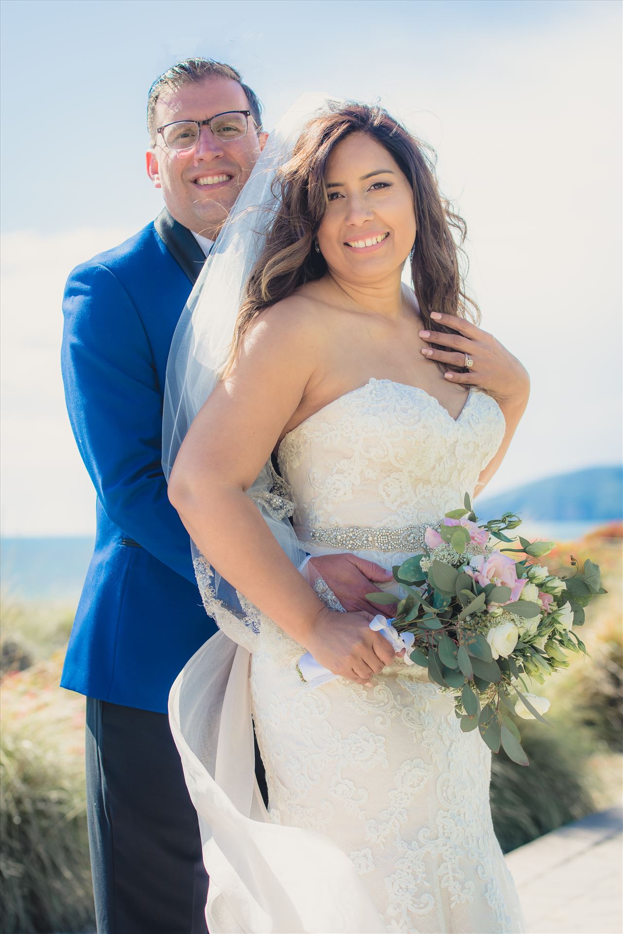 Candy and Christopher 26 - Wedding at Dolphin Bay Resort and Spa in Shell Beach, California by Sarah Williams of Mirror's Edge Photography, a San Luis Obispo County Wedding Photographer. Bride and Groom by the Ocean after wedding. by Sarah Williams