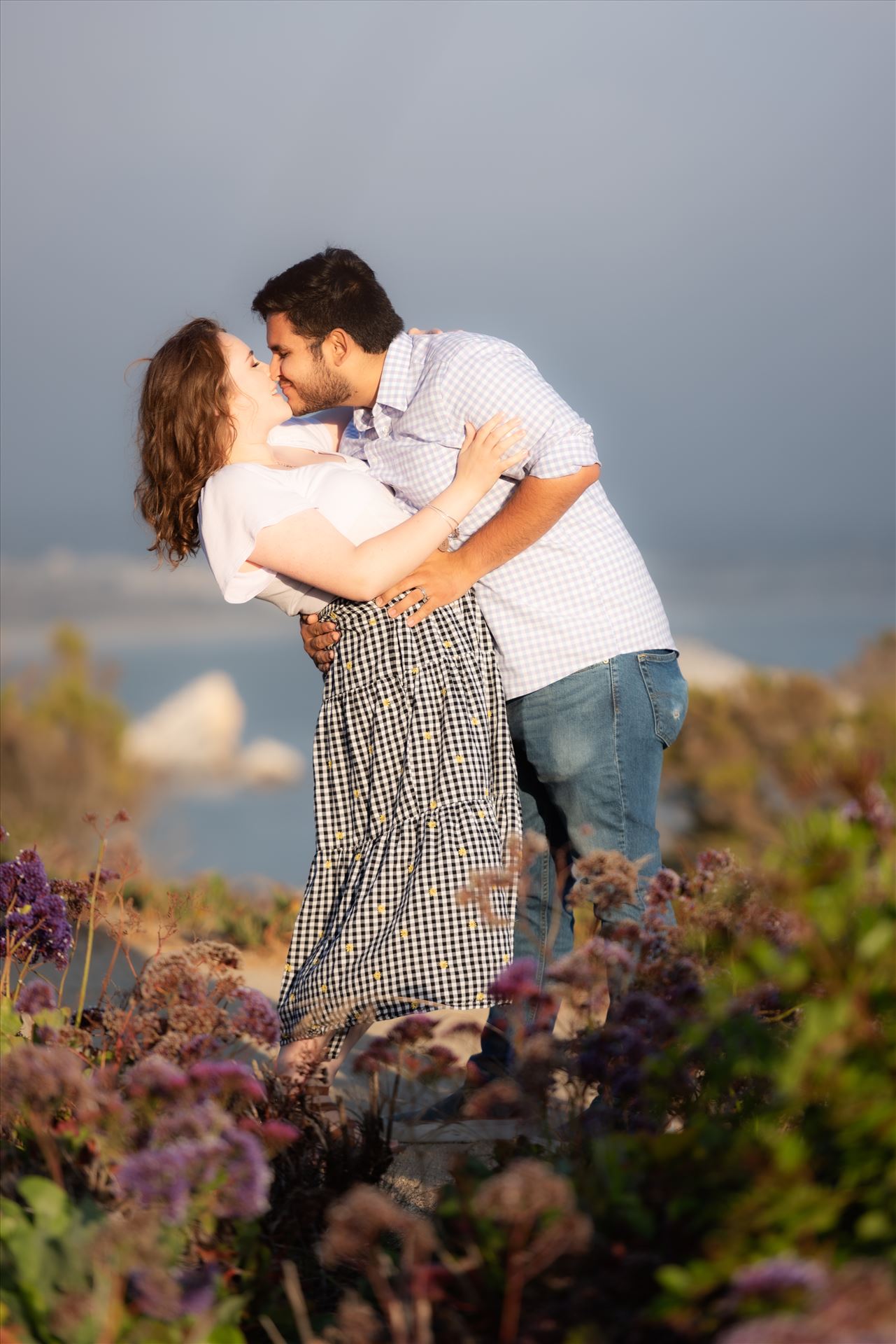 Final-5.JPG - Sarah Williams of Mirror's Edge Photography, a San Luis Obispo Wedding and Engagement Photographer, captures Kara-Leigh and Deaven's amazing Engagement Photography Session at the Dinosaur Caves Park in Pismo Beach California. Dip with Pismo backdrop. by Sarah Williams