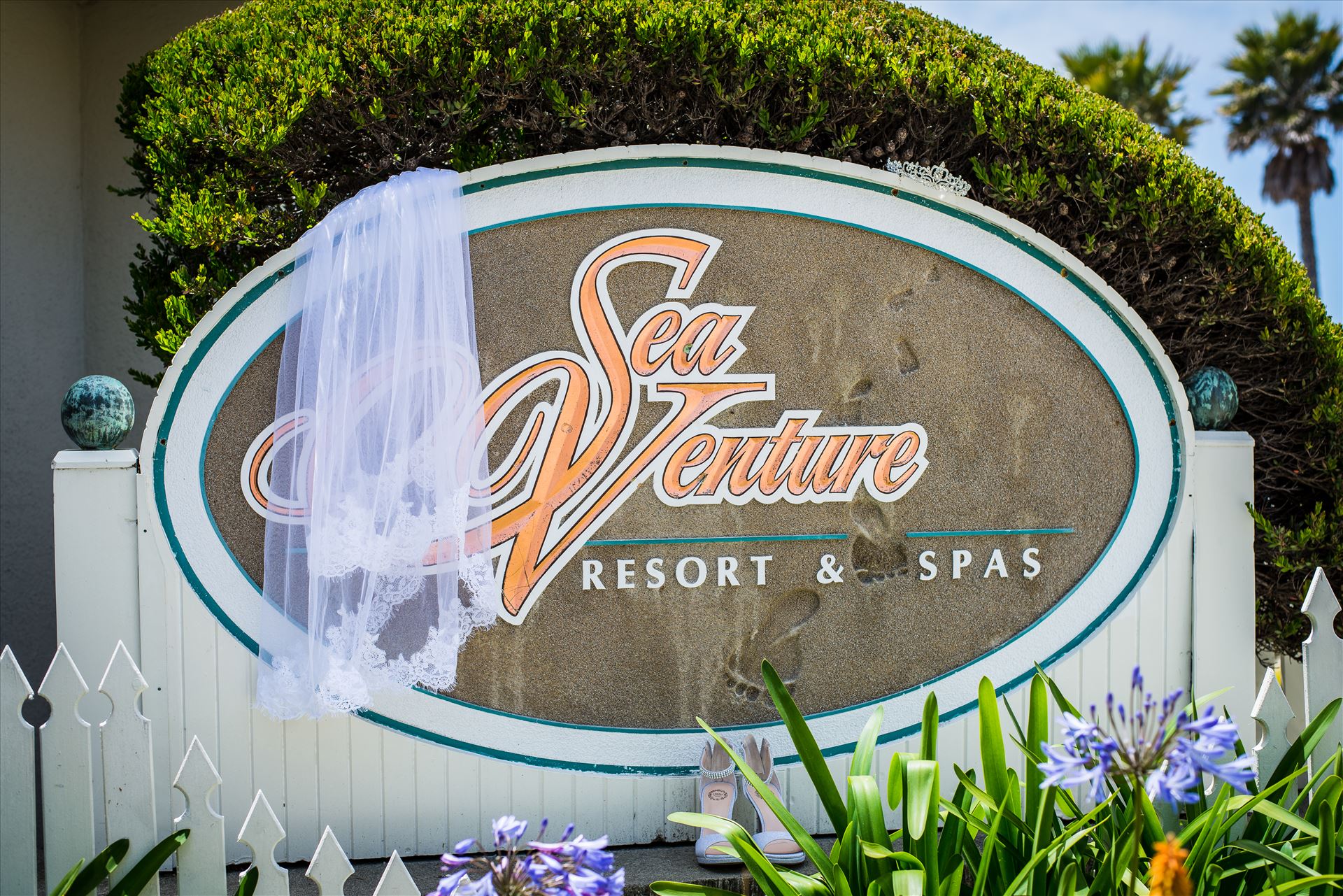 Jessica and Michael 02 - Sea Venture Resort and Spa Wedding Photography by Mirror's Edge Photography in Pismo Beach, California. Wedding Day Sign by Sarah Williams