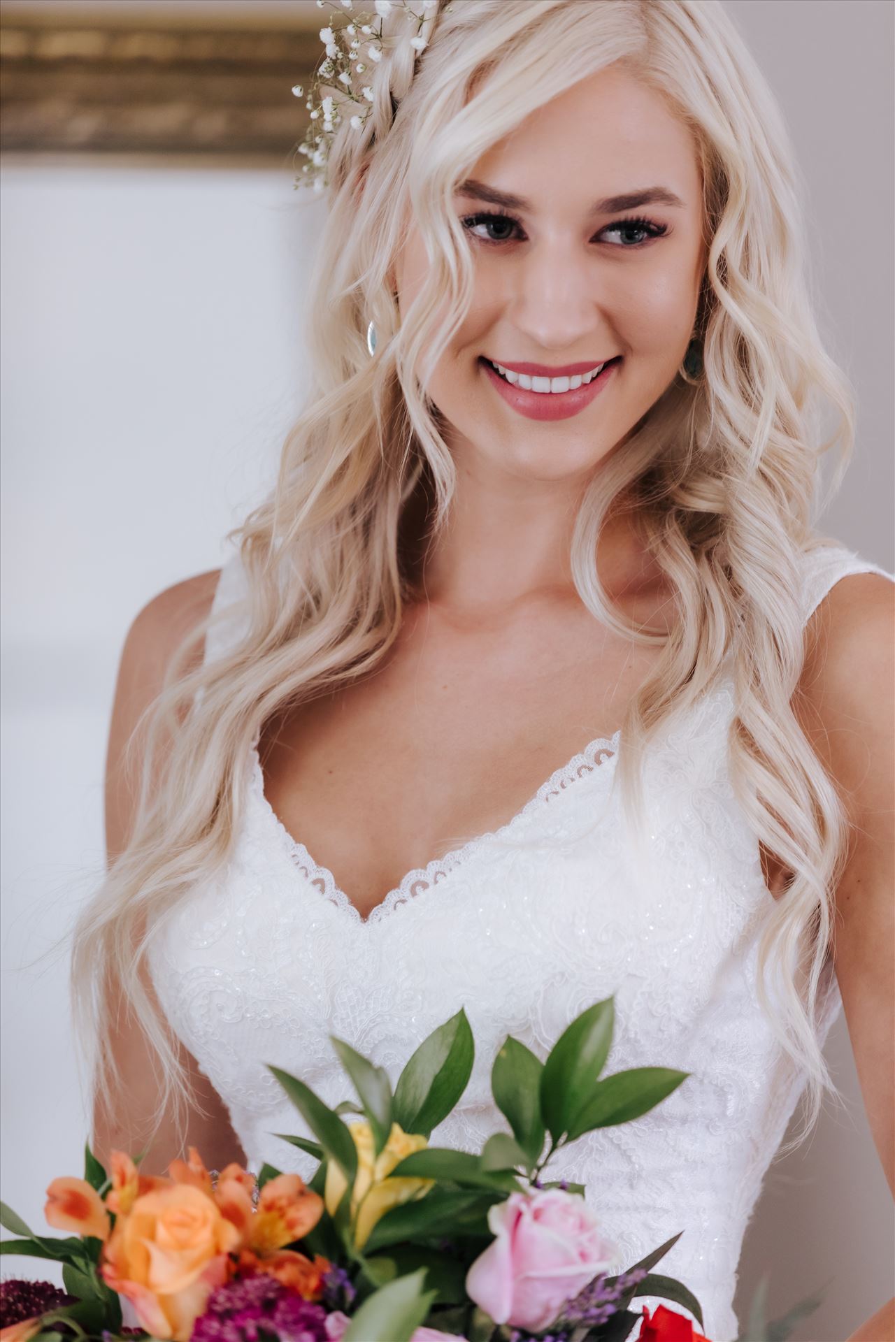 _Y9A6144.JPGPismo Beach Wedding in San Luis Obispo County by Mirror's Edge Photography.  Gorgeous windswept beach wedding vibes with a country and boho flair.  Bride with bouquet.