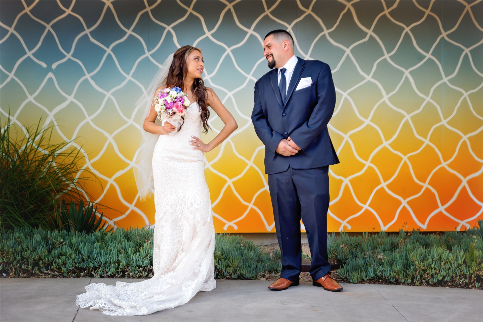 Ana and Juan 36 - Wedding photography at the Kimpton Goodland Hotel in Santa Barbara California by Mirror's Edge Photography.  Retro Chic Wedding Bride and Groom by Sarah Williams