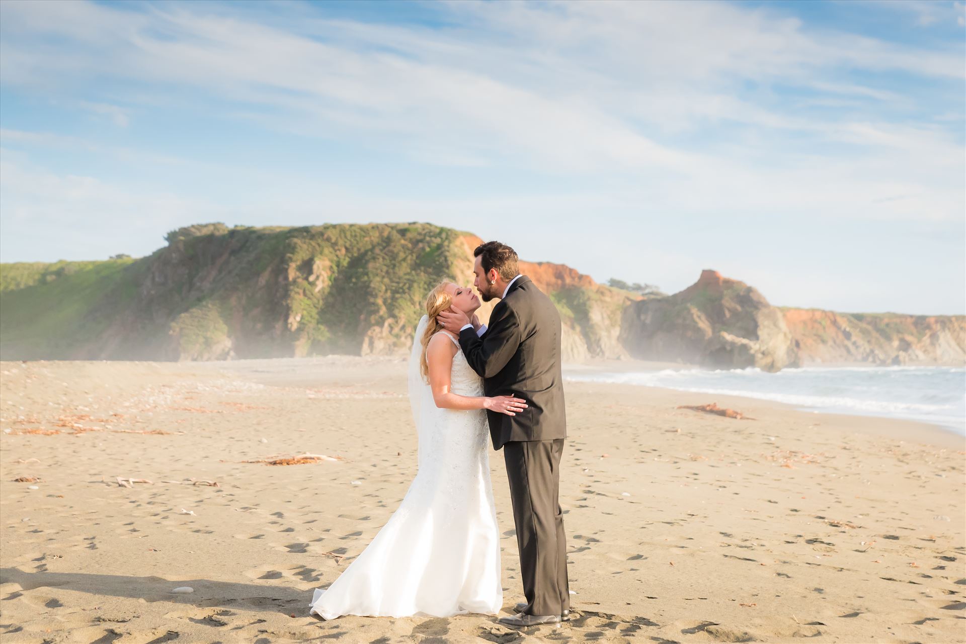 Adele and Jason 23 - Ragged Point Inn Wedding Elopement photography by Mirror's Edge Photography in San Simeon Cambria California. Bride and Groom at sunset on the beach. Big Sur Wedding Photography by Sarah Williams