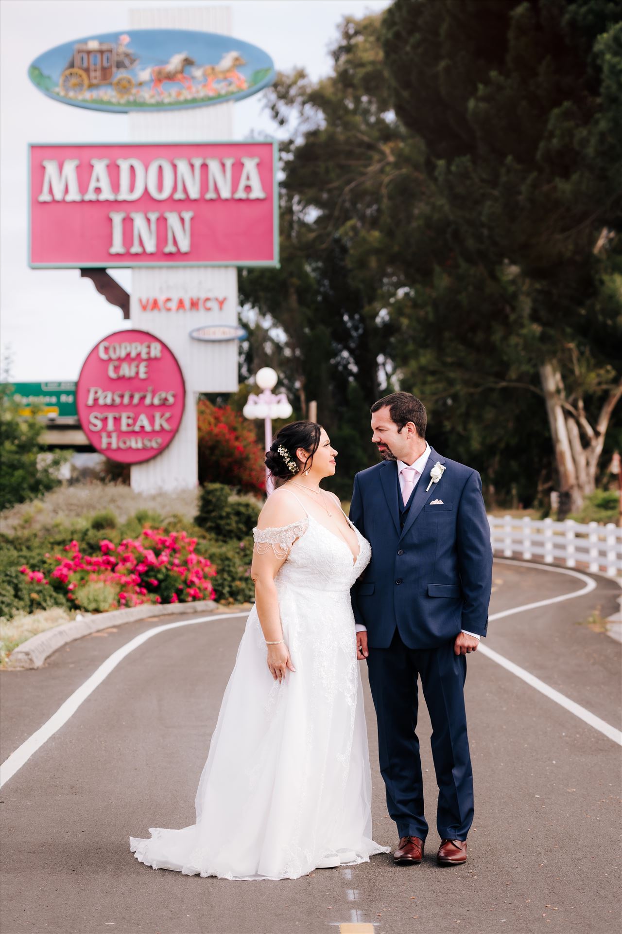 Sneak Peek--11.JPG - Mirror's Edge Wedding Photography, a San Luis Obispo and Santa Barbara County photographer capture the Nagy's Madonna Inn Wedding. Madonna Inn Sign. by Sarah Williams