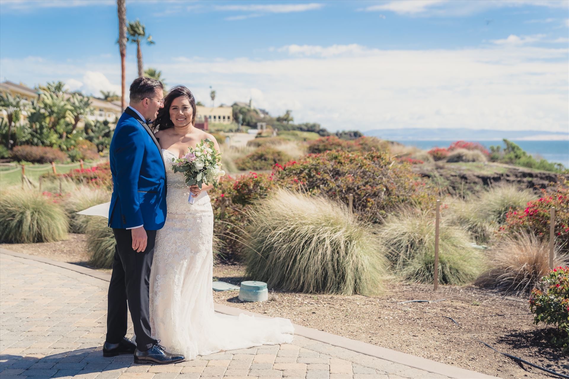 Candy and Christopher 22 - Wedding at Dolphin Bay Resort and Spa in Shell Beach, California by Sarah Williams of Mirror's Edge Photography, a San Luis Obispo County Wedding Photographer. Bride and Groom overlooking Pismo Beach by Sarah Williams