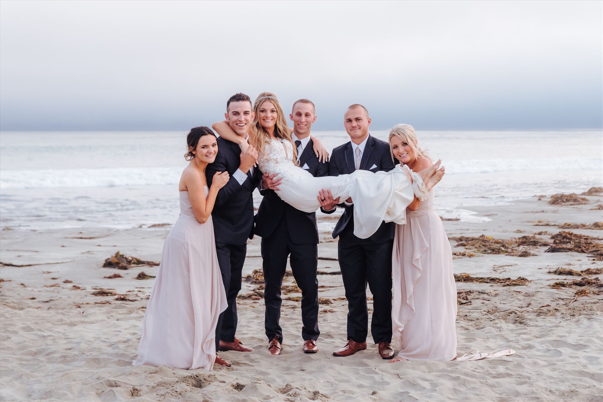 Courtney and Doug 66 - Mirror's Edge Photography, San Luis Obispo Wedding Photographer captures Cayucos Wedding on the beach and bluffs in Cayucos Central California Coast. Wedding Party Bridal Party at the Beach by Sarah Williams