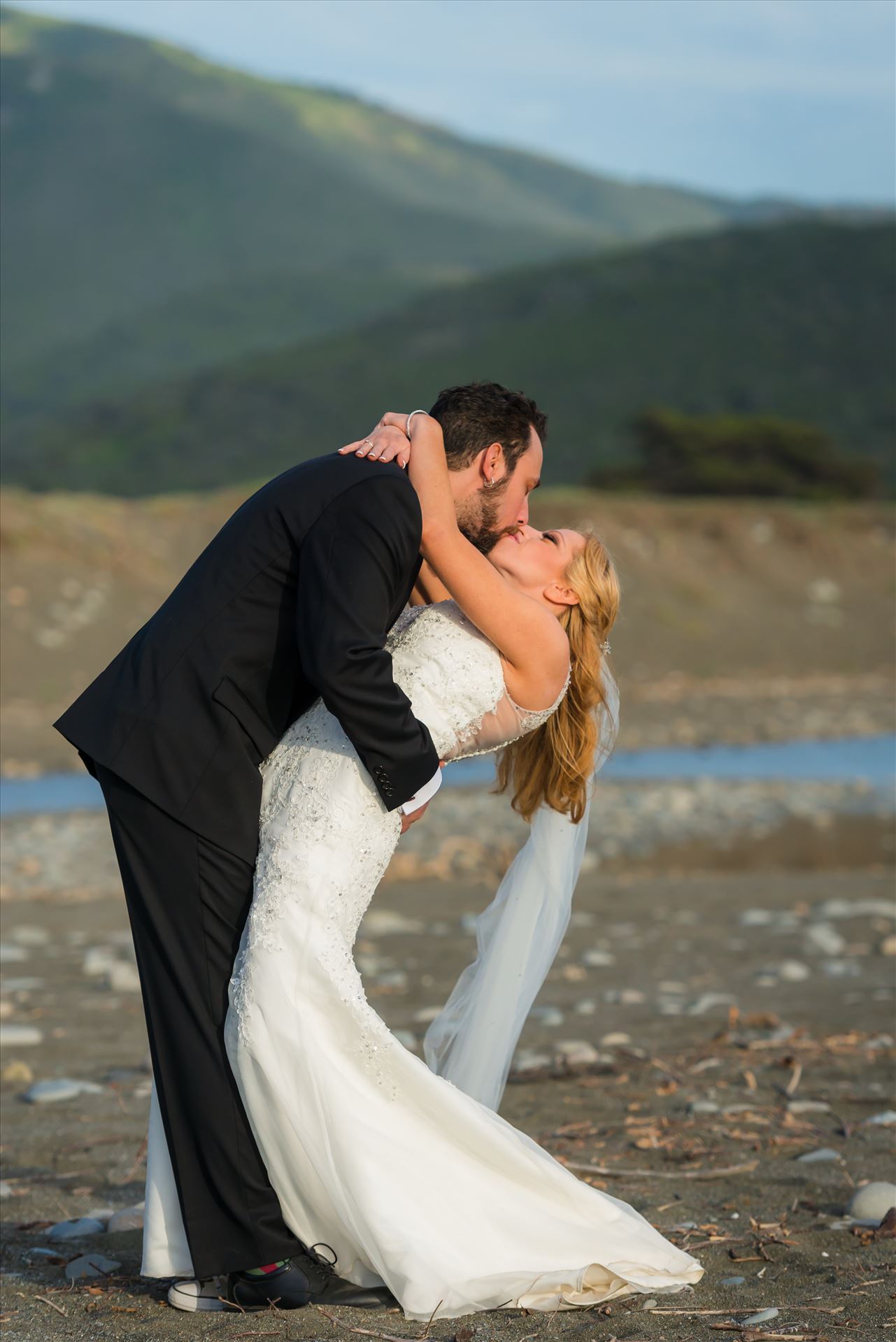 Adele and Jason 07 - Ragged Point Inn Wedding Elopement photography by Mirror's Edge Photography in San Simeon Cambria California. Bride and groom dip on the sand. Big Sur Wedding Photography by Sarah Williams