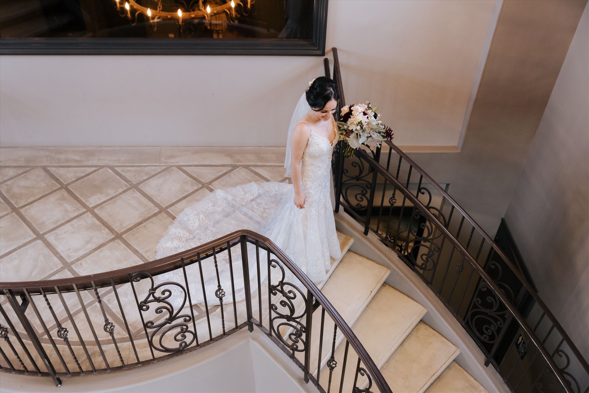 Edith and Kyle 011 - Mirror's Edge Photography captures Edith and Kyle's wedding at the Tooth and Nail Winery in Paso Robles California. Bride getting ready for the First Look on the stairs by Sarah Williams