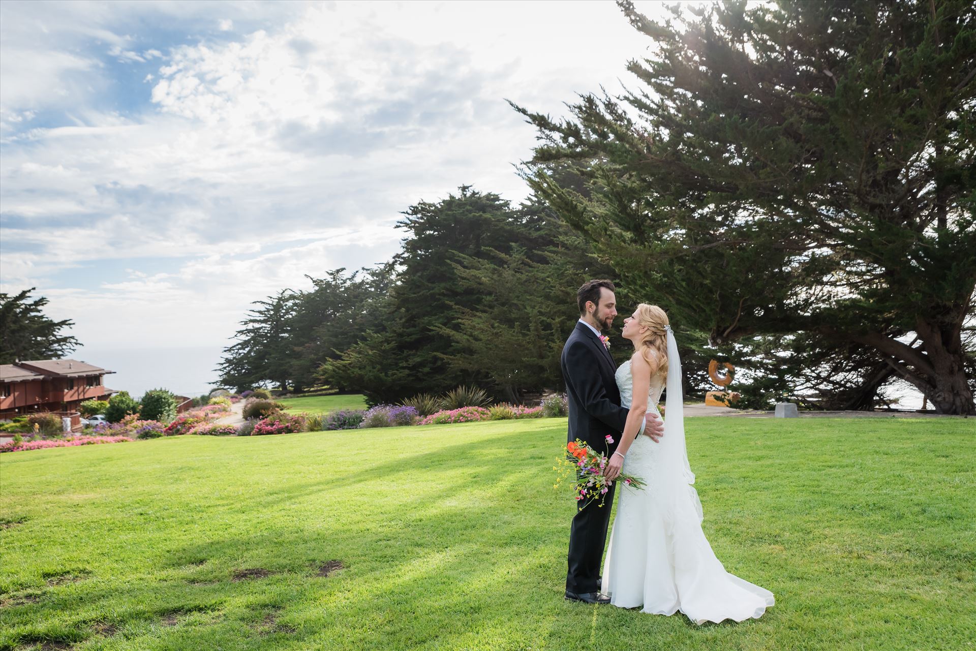 Adele and Jason 50 - Ragged Point Inn Wedding Elopement photography by Mirror's Edge Photography in San Simeon Cambria California. Ragged Point Inn lawn bride and groom. Big Sur Wedding Photography by Sarah Williams