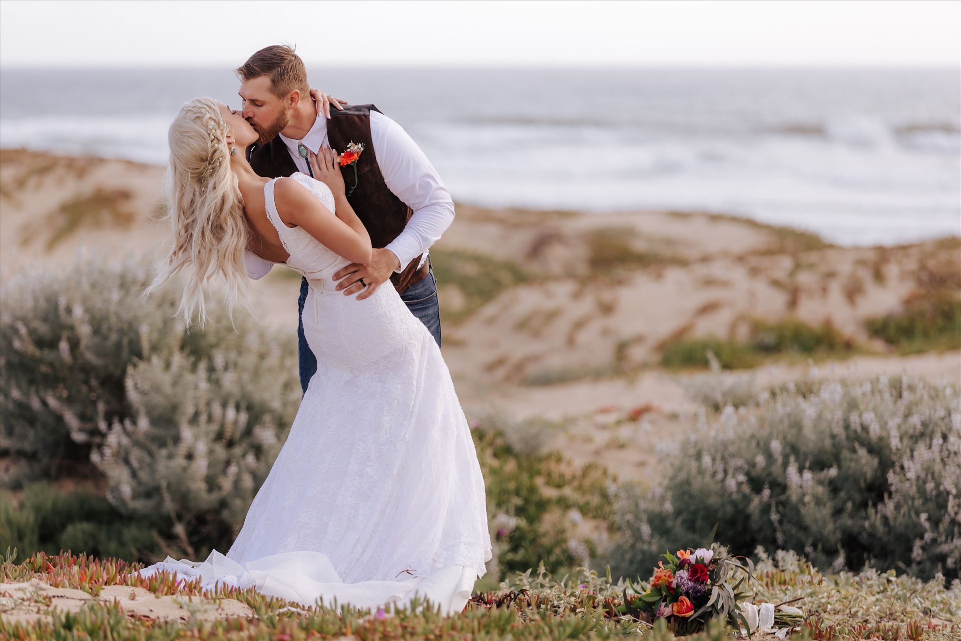 _Y9A6909.JPGPismo Beach Wedding in San Luis Obispo County by Mirror's Edge Photography.  Gorgeous windswept beach wedding vibes with a country and boho flair.  Dip on the beach with ocean behind