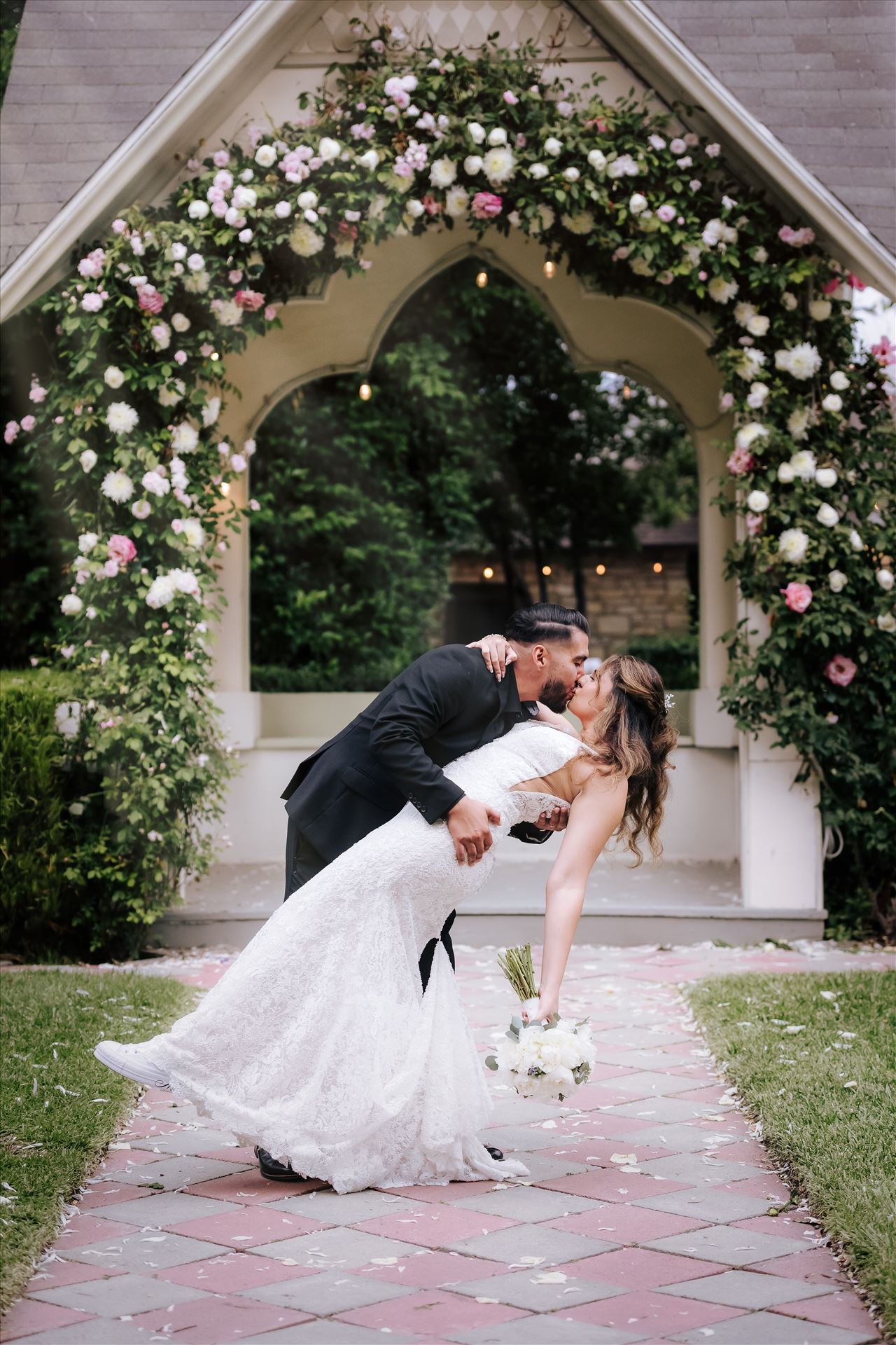 Final--14.JPGKaleidoscope Inn and Gardens wedding in Nipomo in San Luis Obispo County by Mirror's Edge Photography.  Gorgeous rose gardens and Victorian home vibe with romance and deep colors.  Bride and Groom dip