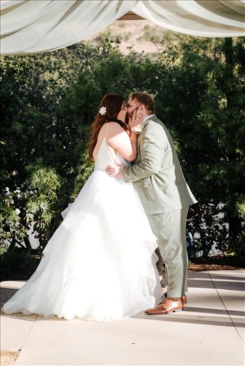 Sarah Williams of Mirror's Edge Photography, a San Luis Obispo County Wedding and Engagement Photographer, captures the amazing wedding of Justine and Reece at the Monday Club in San Luis Obispo California. The kiss bride and groom