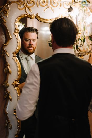 Mirror's Edge Photography captures Sarah and David's magical Madonna Inn Wedding in San Luis Obispo, California.  Groom getting ready.